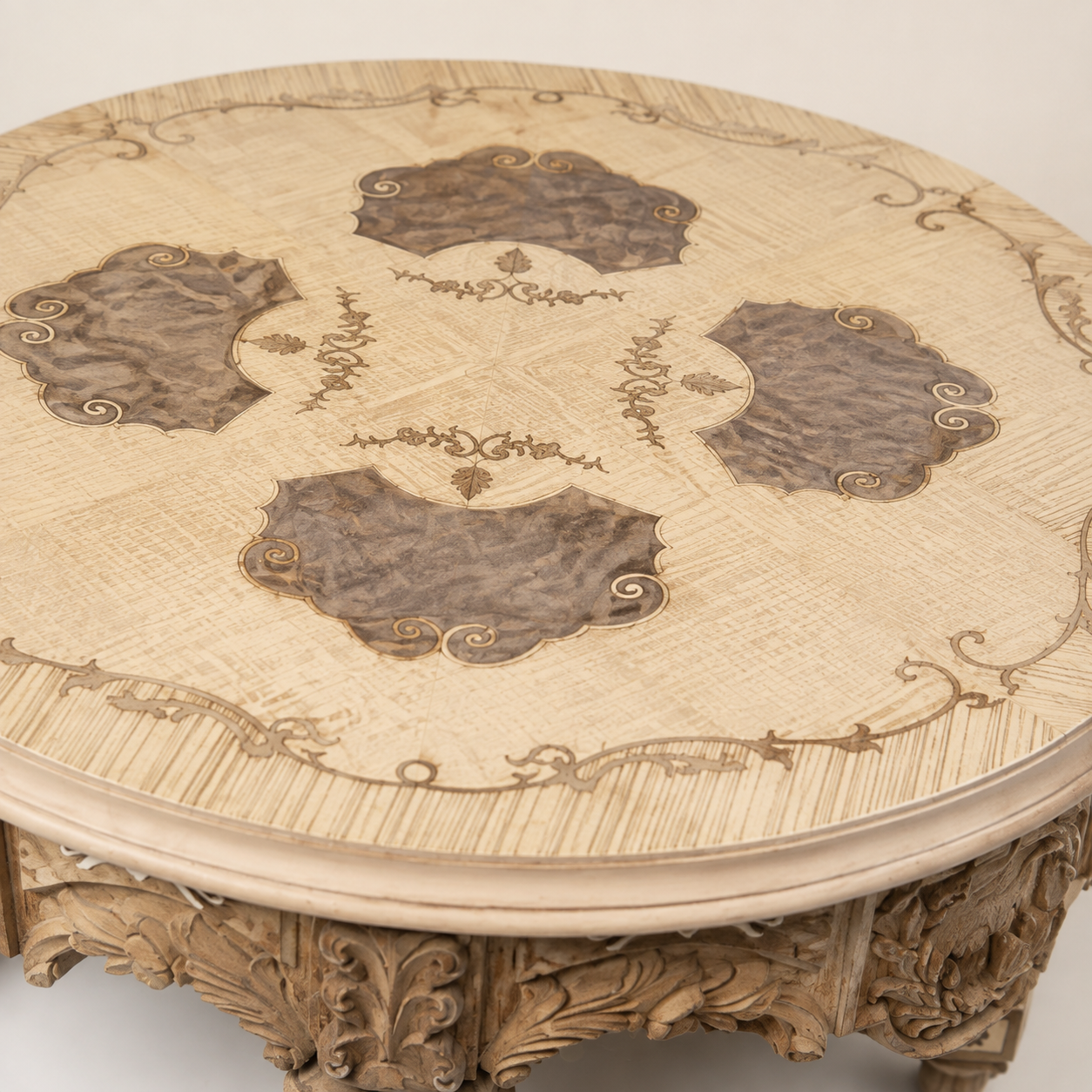 Handcrafted carved pale wood coffee table
